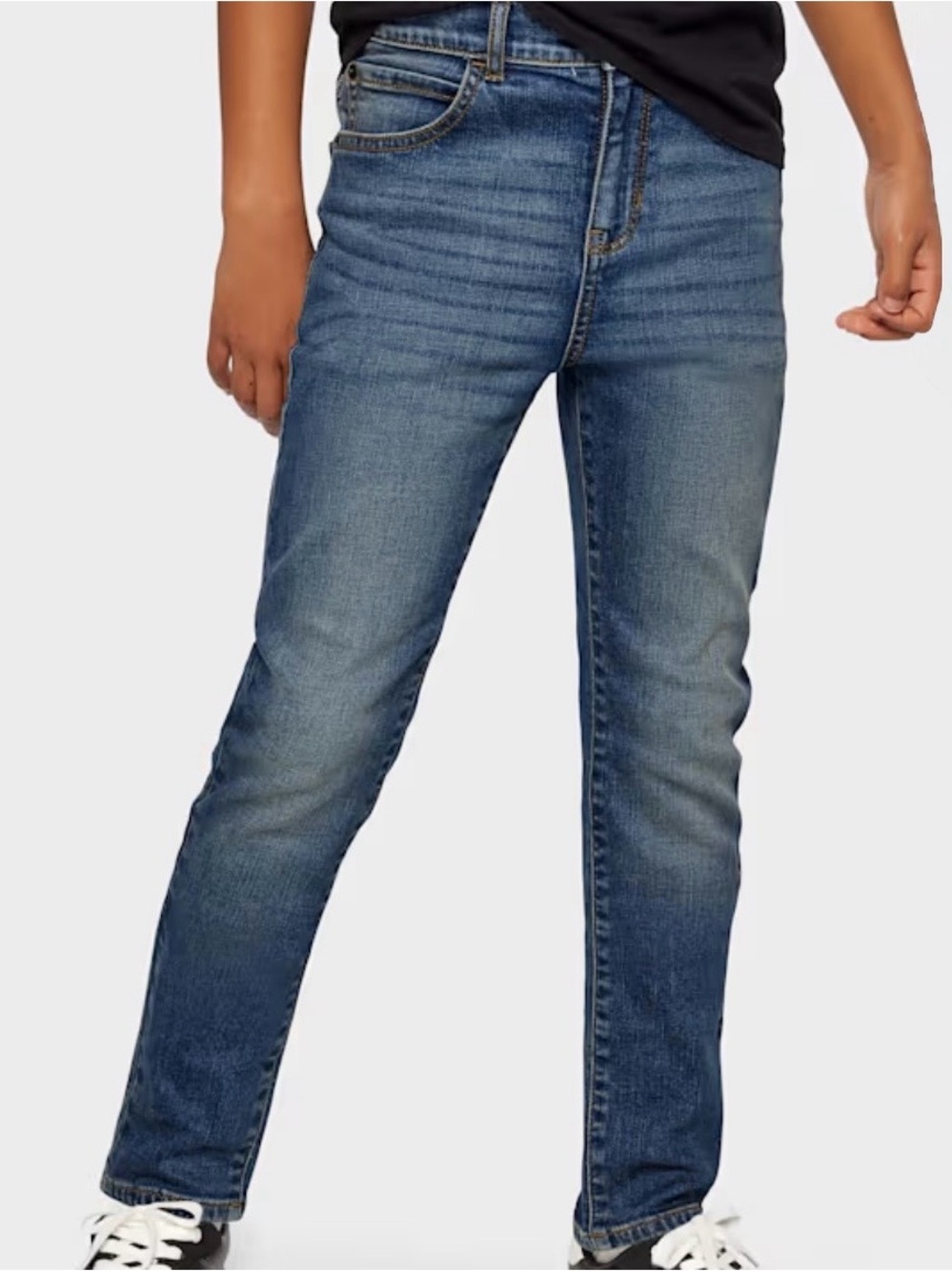 The Children's Place Boys' Stretch skinny jeans in a blue 10 Husky